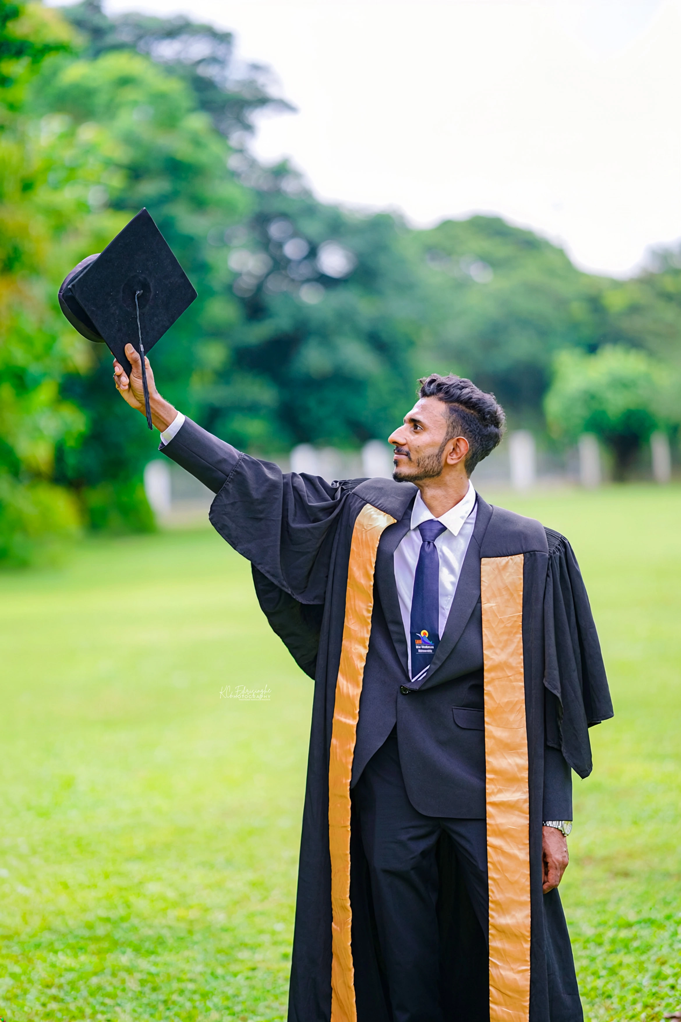 Editorial graduation portrait outside a university building in Colombo