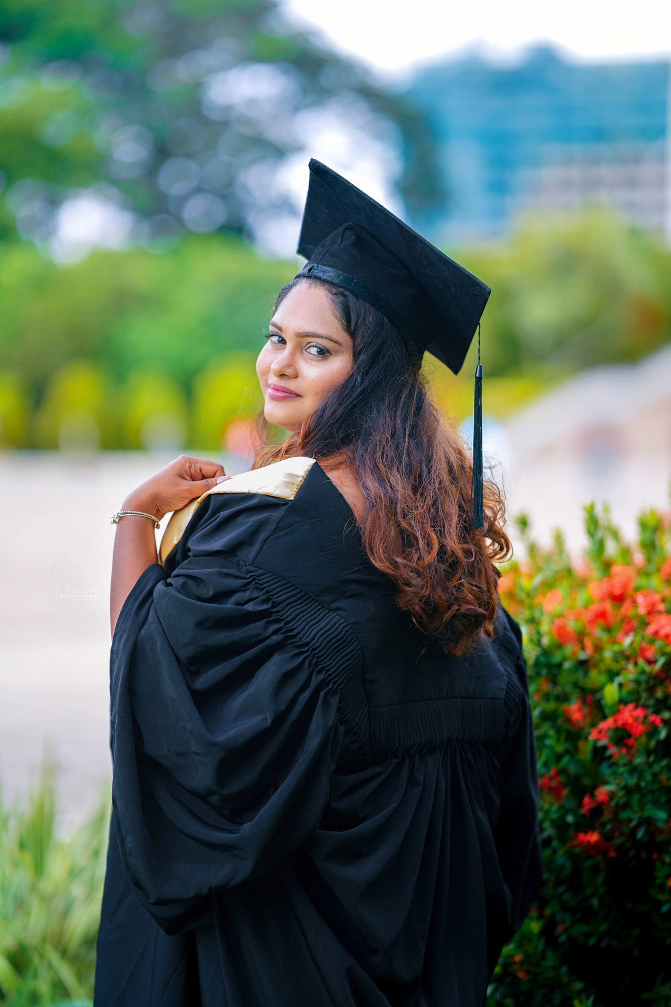 Editorial graduation portrait outside a university building in Colombo