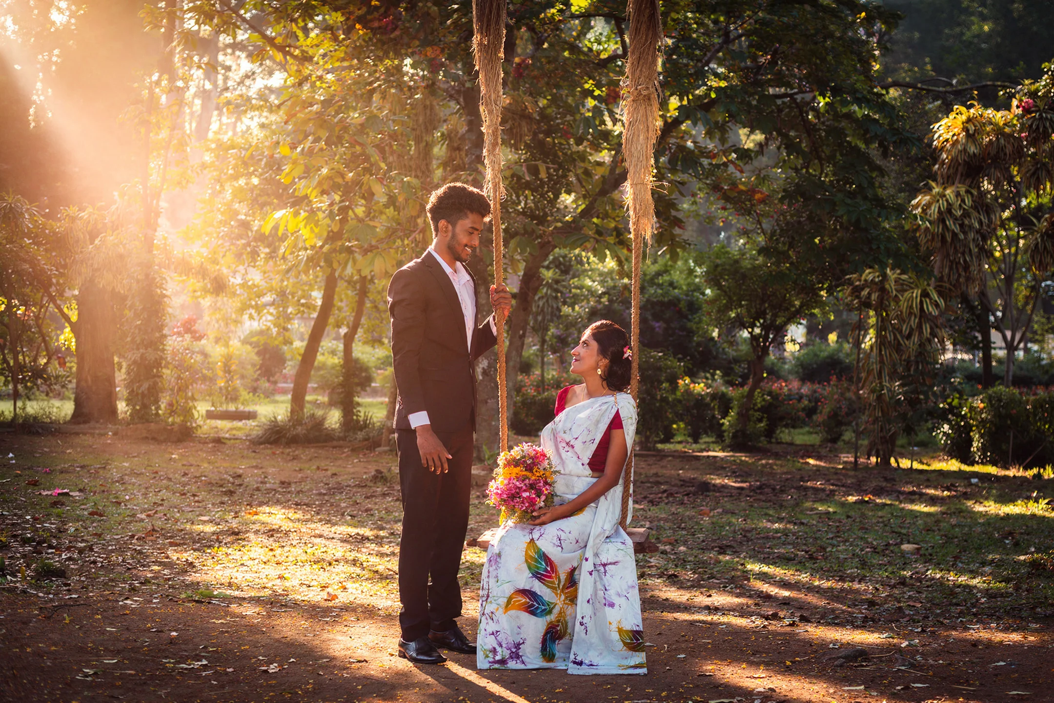 Sri Lankan couple walking together during a golden hour pre-shoot