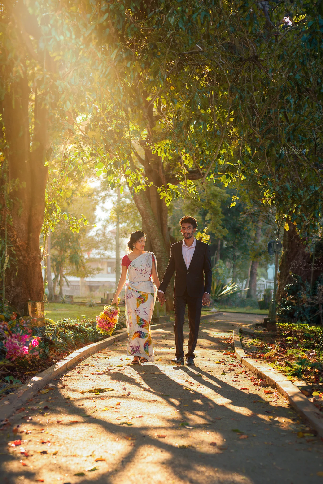 Sri Lankan couple walking together during a golden hour pre-shoot