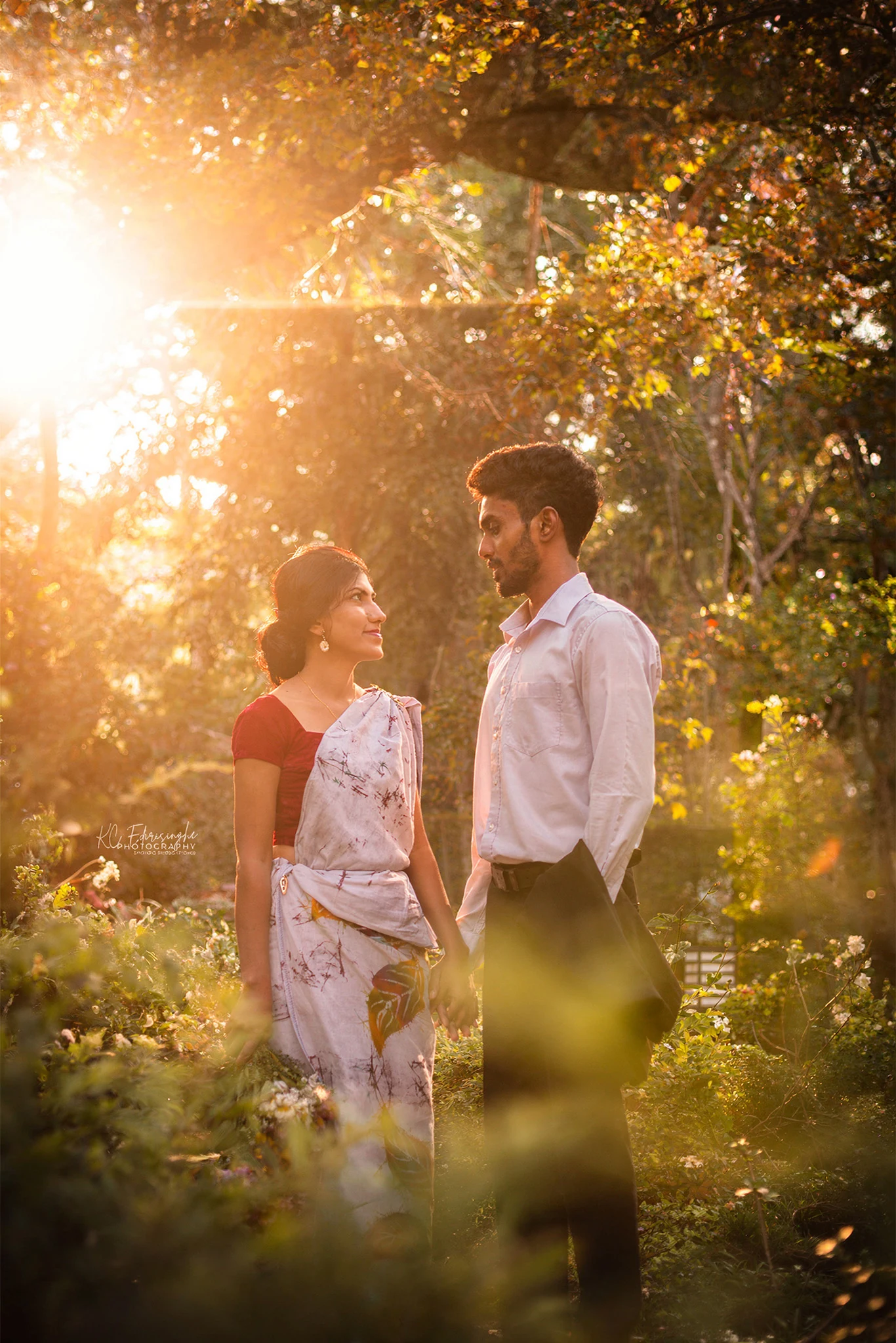 Sri Lankan couple walking together during a golden hour pre-shoot