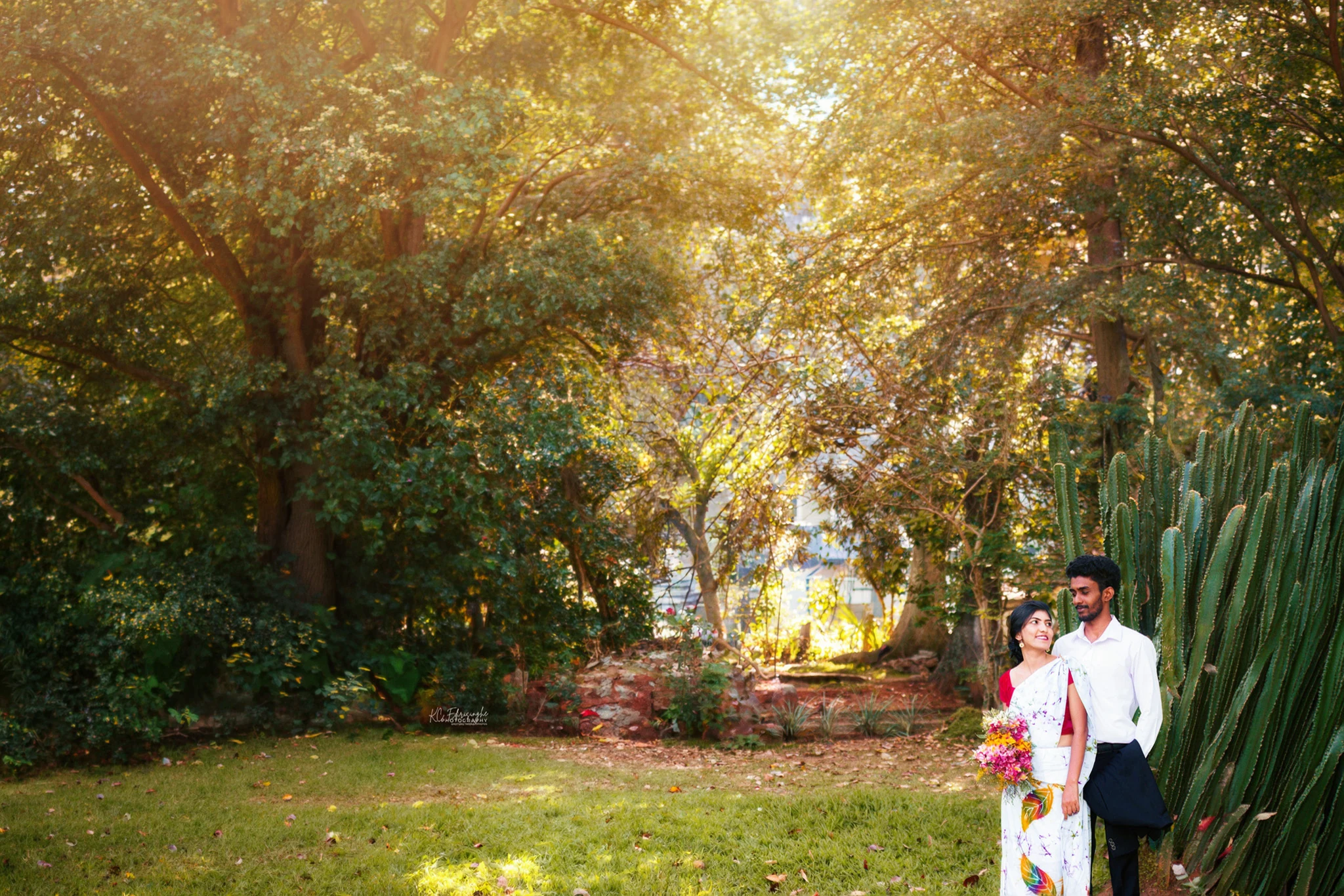 Sri Lankan couple walking together during a golden hour pre-shoot